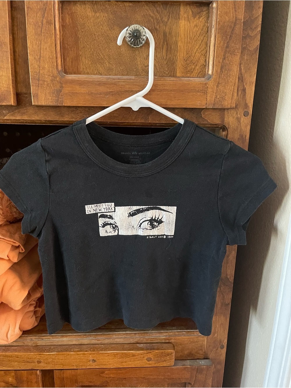 Brandy Melville Black Crop Tee with White Eye Graphic